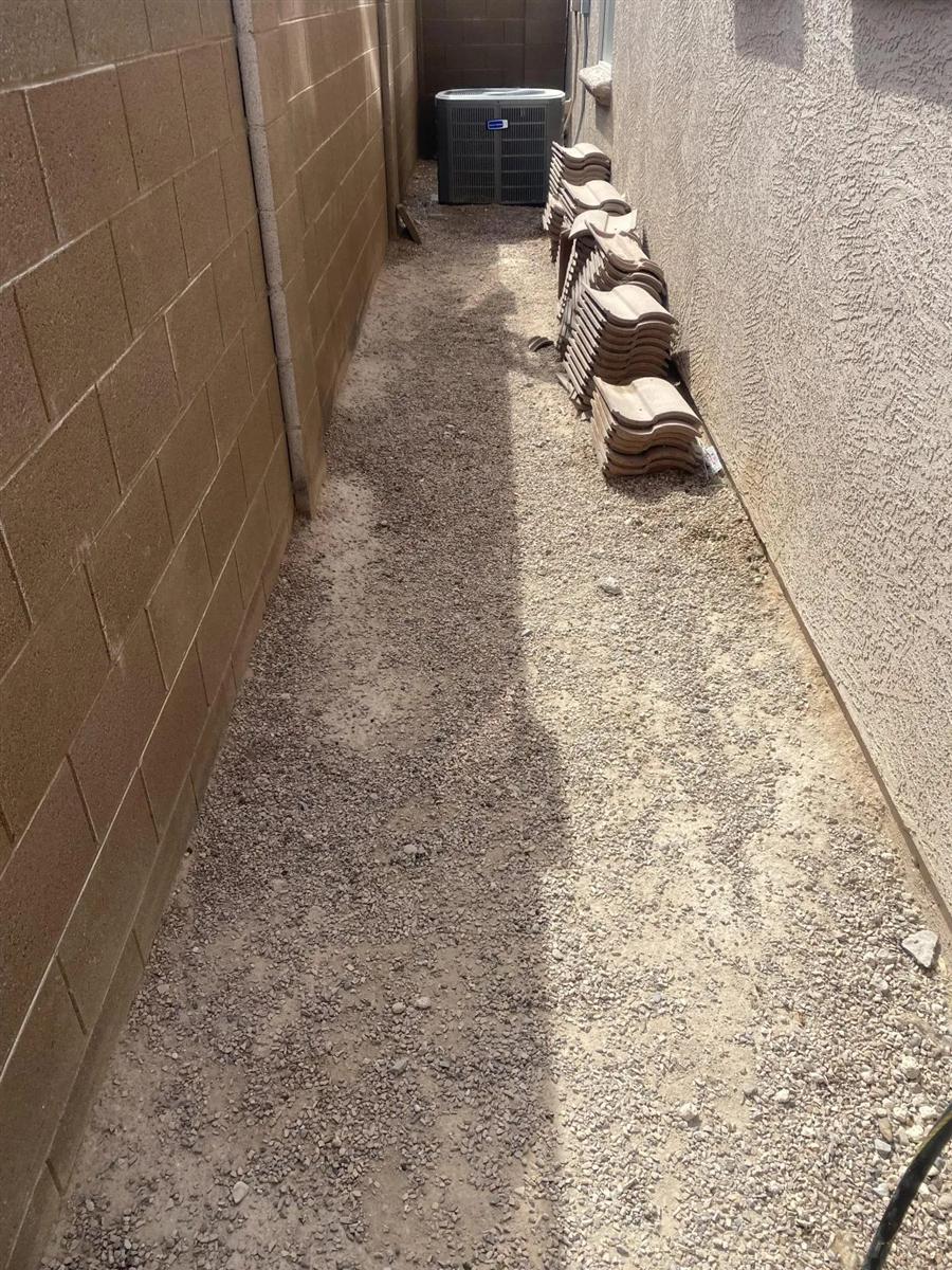Clean gravel side yard after service